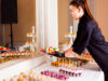 How to reduce food and beverage costs at your European wedding A caterer providing desserts for a wedding.